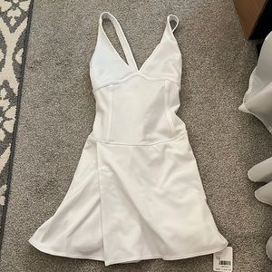 White tennis or golf athletic dress